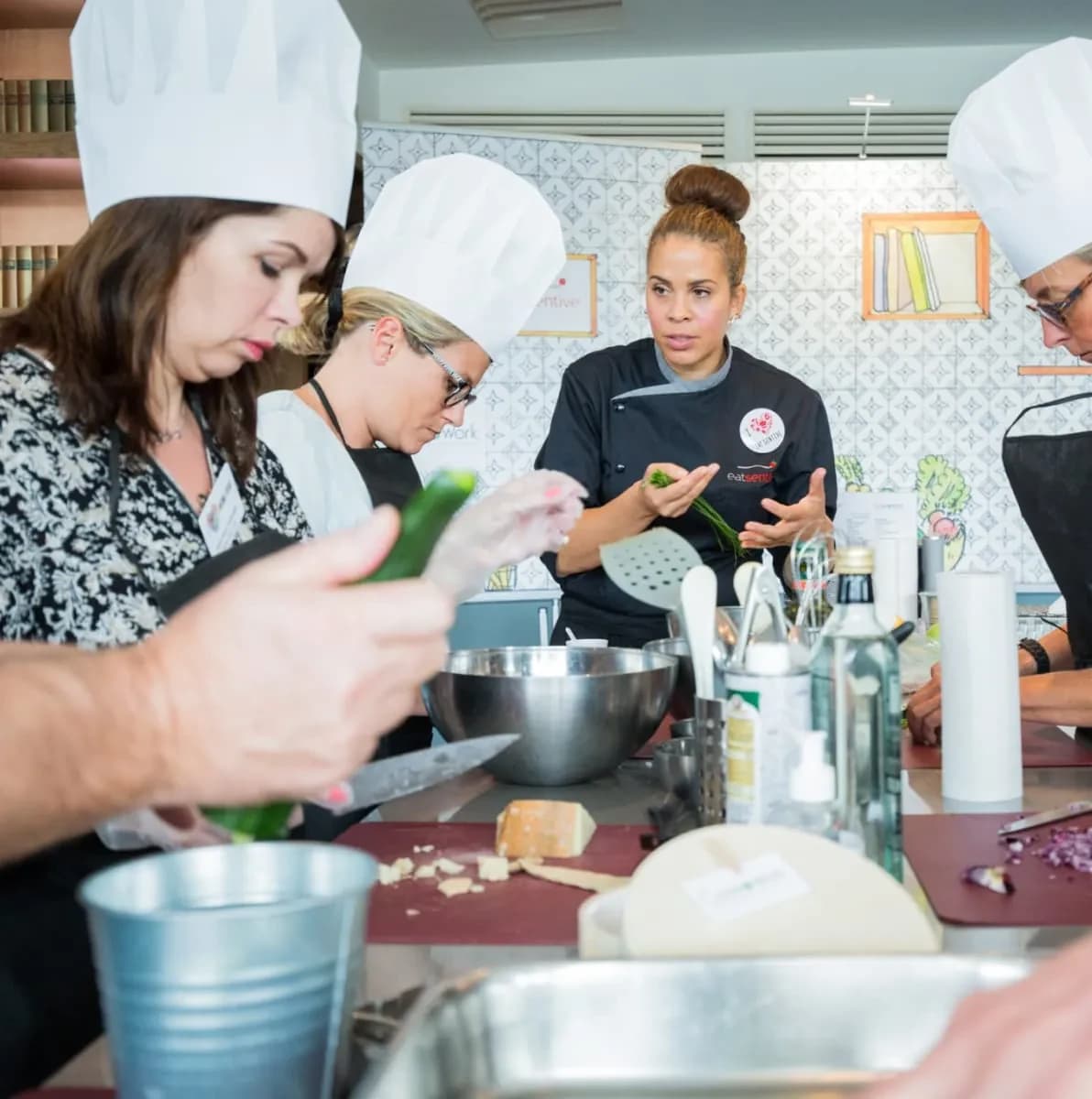 Team preparing canapés during a cooking challenge