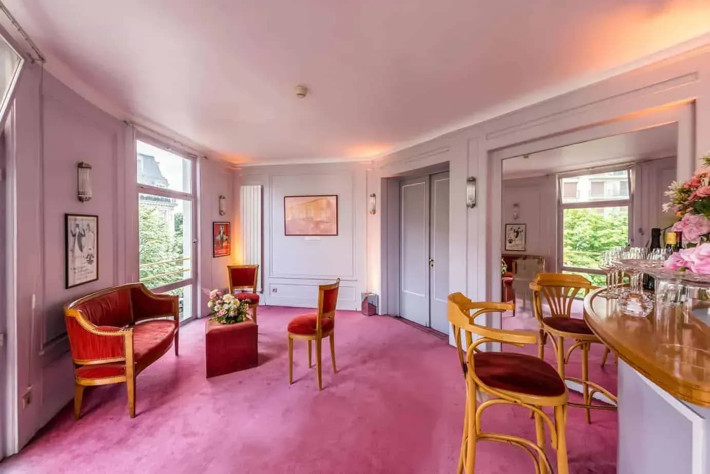 Art Deco private lounge with red velvet seating, Paris 8e