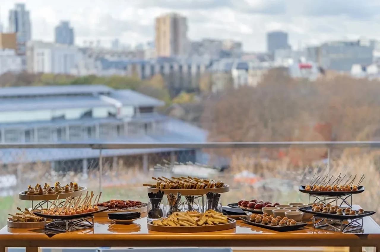 Canapé buffet with a view over the city from L'Envol