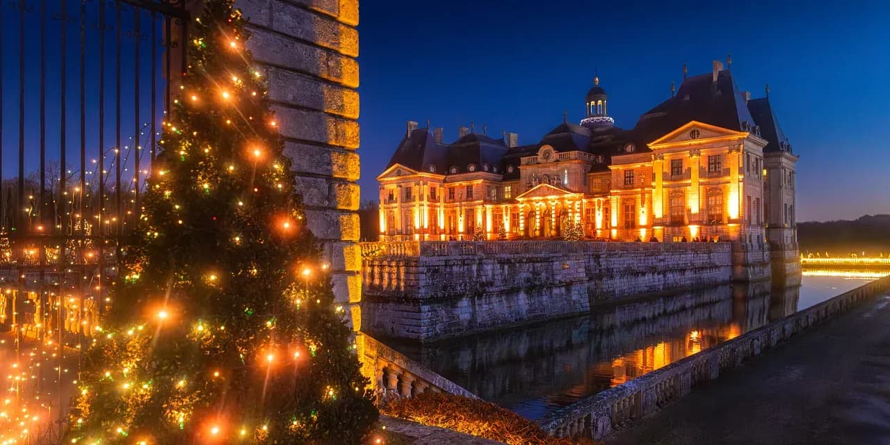 Château de Vaux-le-Vicomte illuminated at night with a Christmas tree, near Paris, France