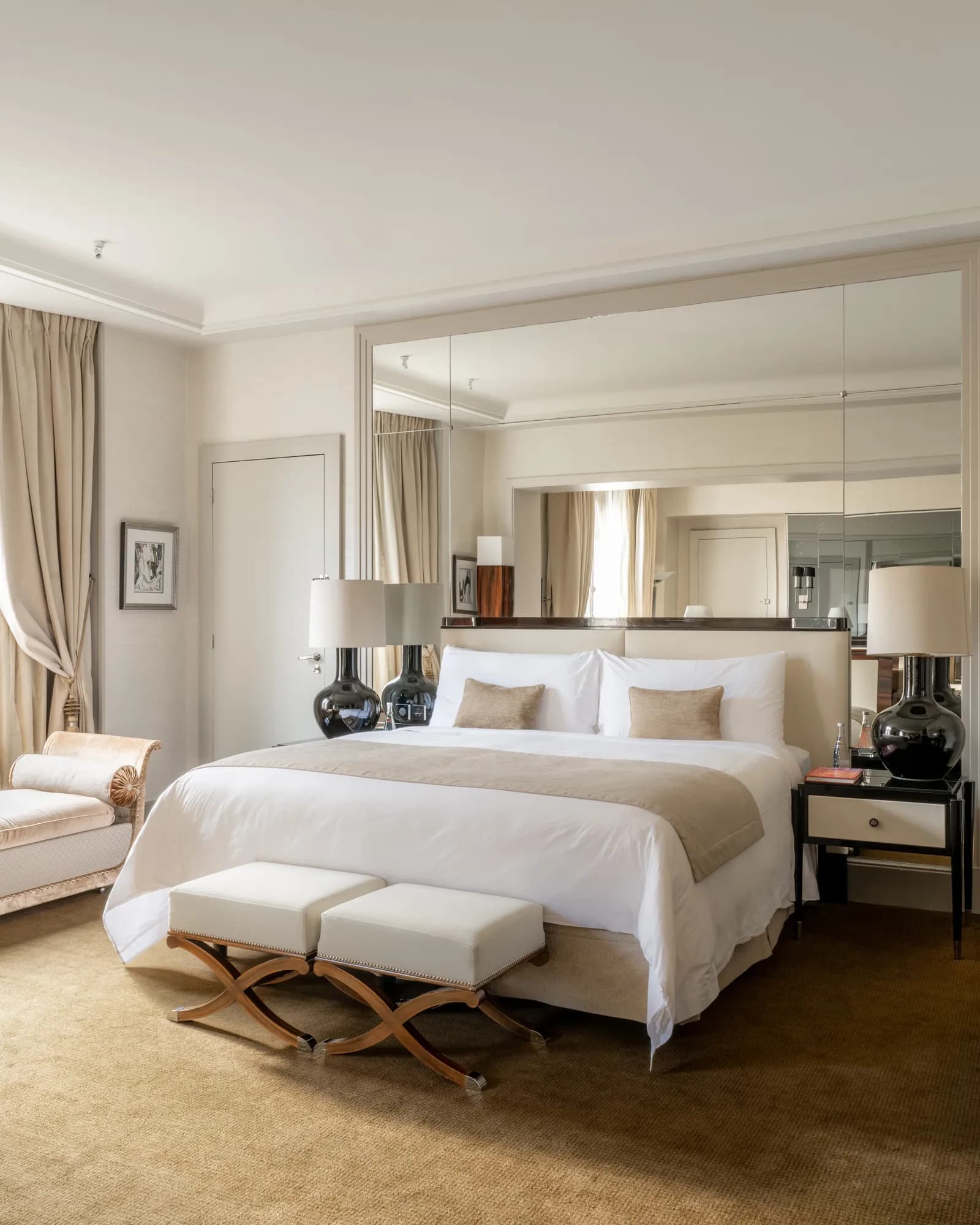 Suite Alma bedroom at Prince de Galles, a Luxury Collection Hotel, Paris, with a mirrored wall