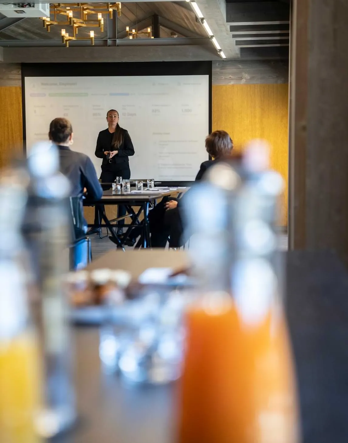 Meeting room with a projection screen and a seminar table at Hameau Albert 1er, Chamonix
