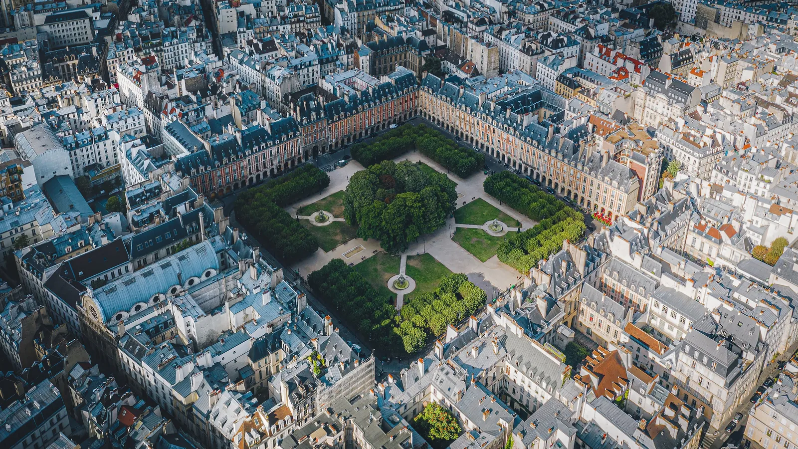Aerial view of the Place des Vosges, where Le Pavillon de la Reine stands in the Marais, Paris