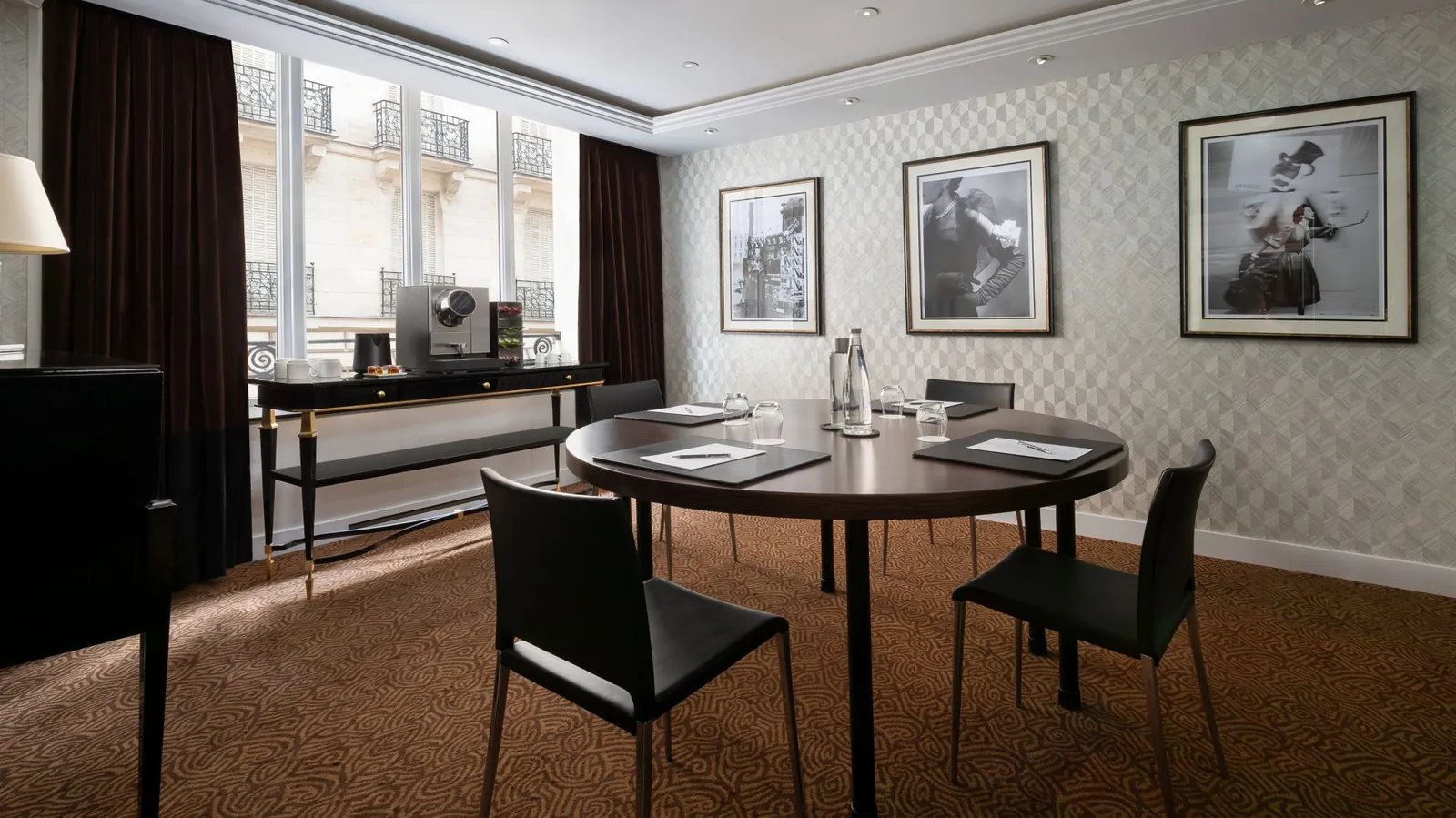 Small meeting room at Prince de Galles, a Luxury Collection Hotel, Paris, with a round table