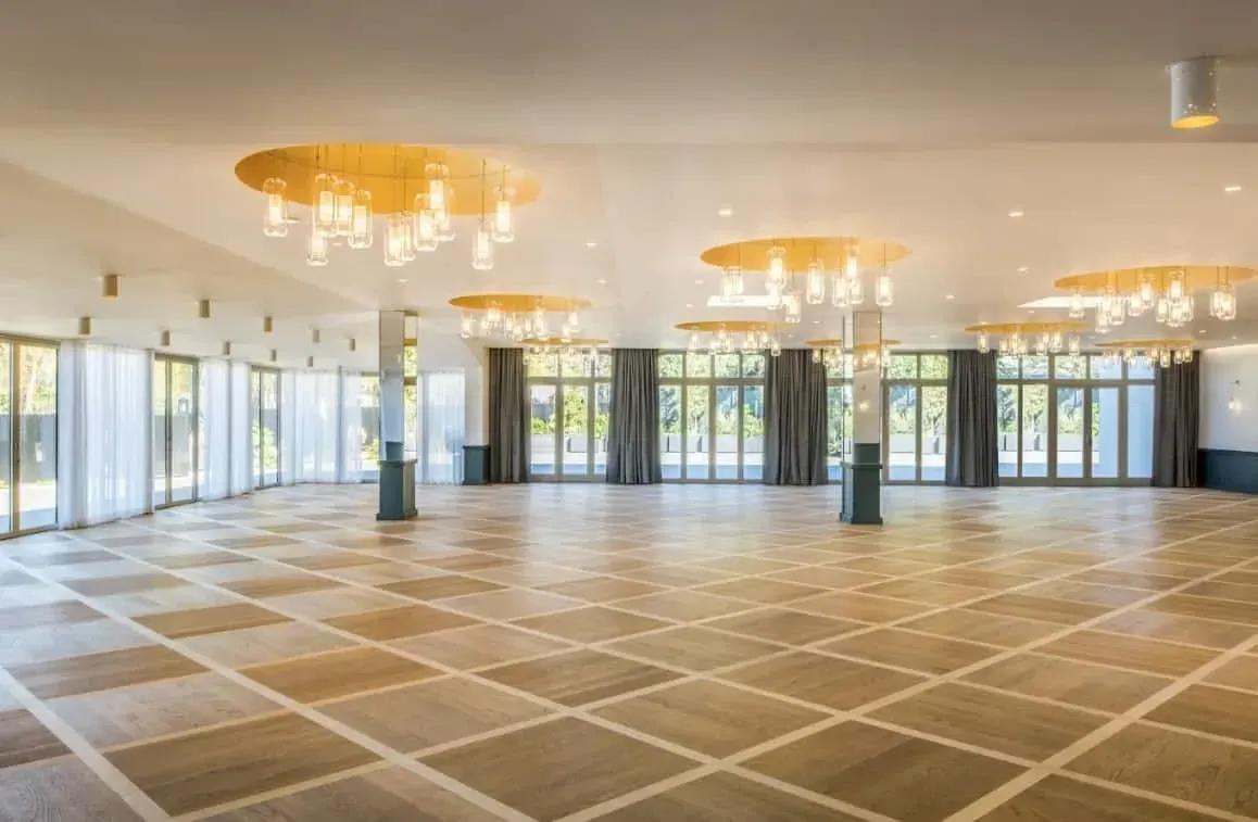 Art Deco hall with chandeliers and large windows