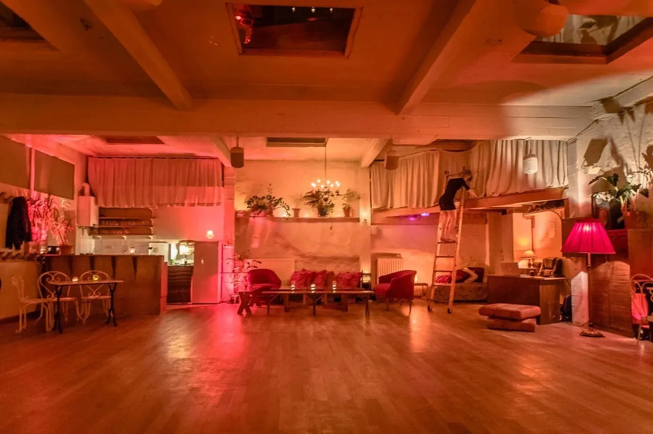 Loft corner with red lamps and plants