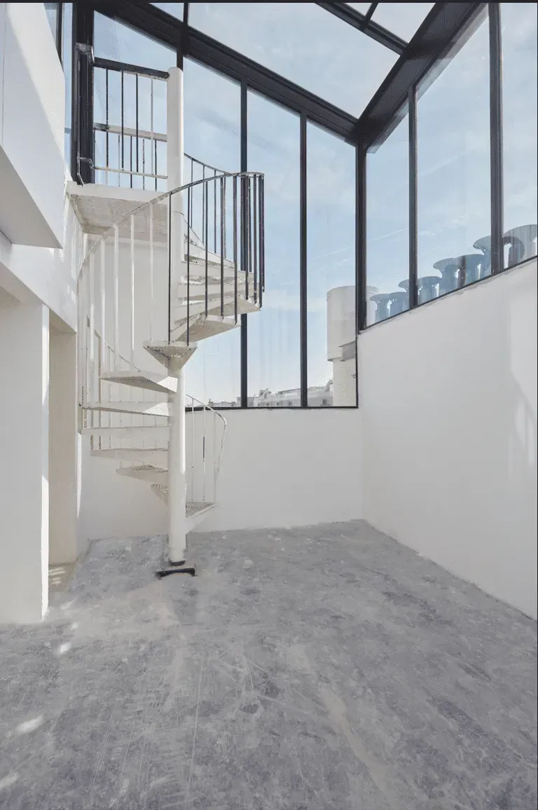 Spiral Staircase Loft with Eiffel Tower Views: interior and atmosphere, Paris 8e